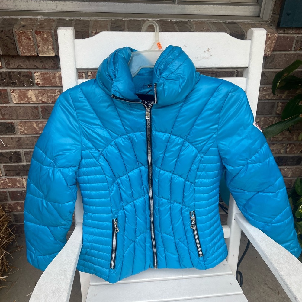 Guess bubble coat. It don’t have a hoodie attached.